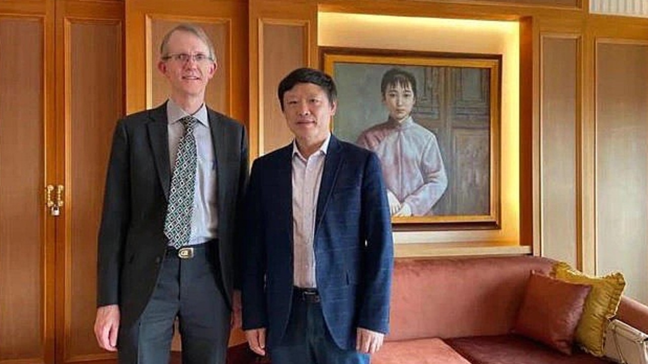 Hu Xijin with Australia’s ambassador to China, Graham Fletcher.