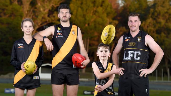 Lobethal Football Club’s Torsten Skinner with his older brother Cooper Skinner, under eight player Jensen Blundell and coach Matthew Fuller. Picture: Naomi Jellicoe