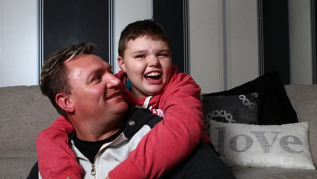 What now? Layton Smith with his dad Troy at home in Claremont Meadows. Picture: Tim Hunter