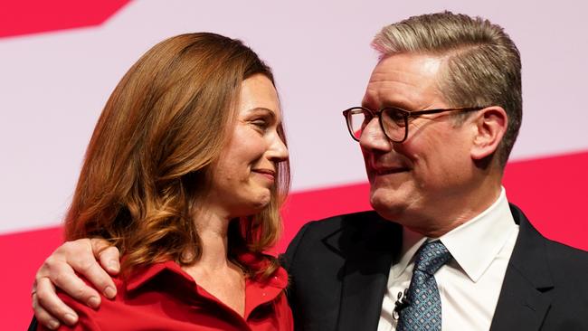 Sir Keir Starmer hugs his wife Victoria after delivering his keynote speech.