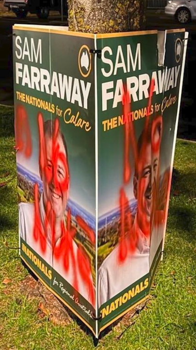 Volunteer trashes rival campaign signs