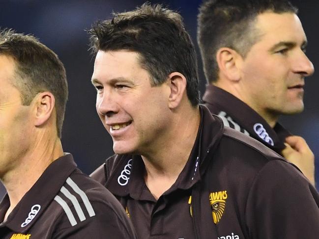MELBOURNE, AUSTRALIA - JUNE 17: Alastair Clarkson the coach of the Hawks and assistant coach Brett Ratten chat during the round 13 AFL match between the North Melbourne Kangaroos and the Hawthorn Hawks at Etihad Stadium on June 17, 2016 in Melbourne, Australia. (Photo by Quinn Rooney/Getty Images)