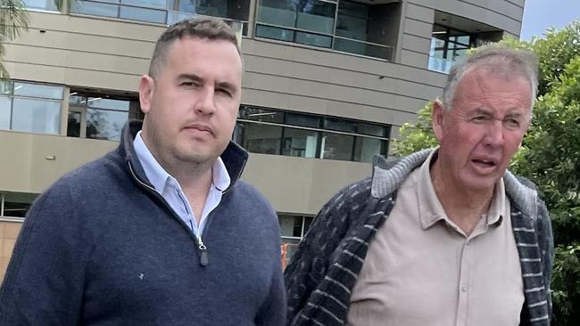 Blake Burgess and Gregory Burgess leave Coffs Harbour court on May 19, charged with manslaughter over the death of Martin Strait in 2021.
