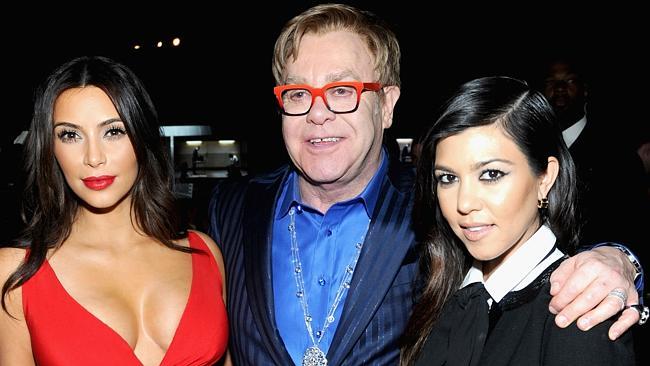 Kim Kardashian, Sir Elton John and Kourtney Kardashian attend the 22nd Annual Elton John AIDS Foundation Academy Awards Viewing Party. (Photo by Jamie McCarthy/Getty Images for EJAF)