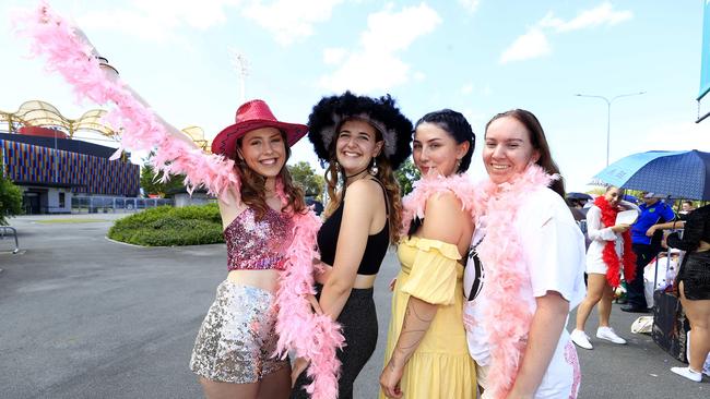 Ruby Morrissy 23 from Melbourne, Isabella Thomas 23 Melbourne, Casey Rowe 20 from GC, Madi Kingston 22 from GC stand in line with thousands of others at Heritage Bank Stadium waiting to get into the Harry Styles convert later today. Pics Adam Head