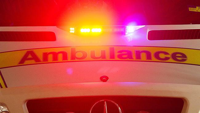 Emergency services have treated a woman for back pain following a two-truck crash at Booubyjan.