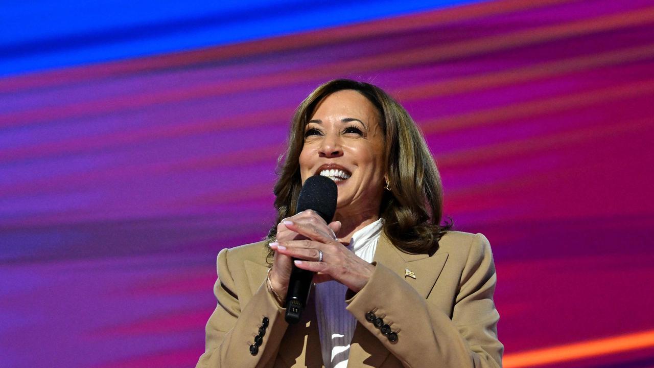 Kamala Harris speaks on the first day of the Democratic National Convention. (Photo by Robyn Beck / AFP)