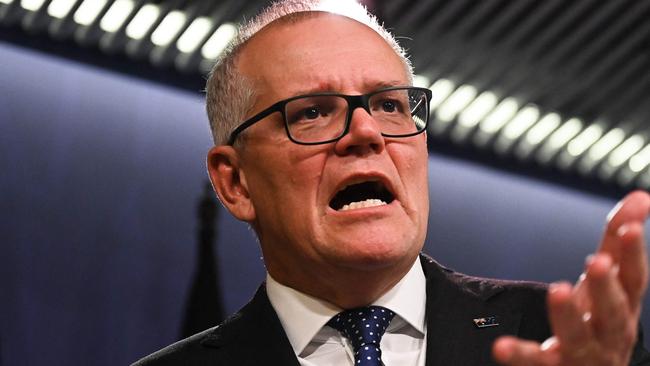 Australia's former prime minister Scott Morrison has backed his decision to secretly take on five ministries. (Photo by Steven Saphore)