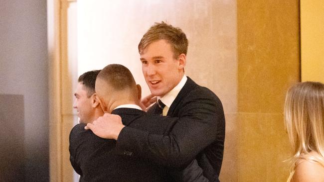 Dustin Martin gets a hug from Tom Lynch. Picture: Mark Stewart