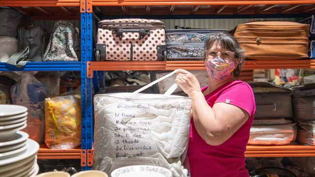 Mend and Make Do Crew co-ordinator Ursula Tunks readies another kit go out to the community.