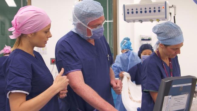 60 Minutes journalist Allison Langdon watches on as surgeons remove a ‘small mandarin’ size cancer from Roxy Jacenko’s left breast.