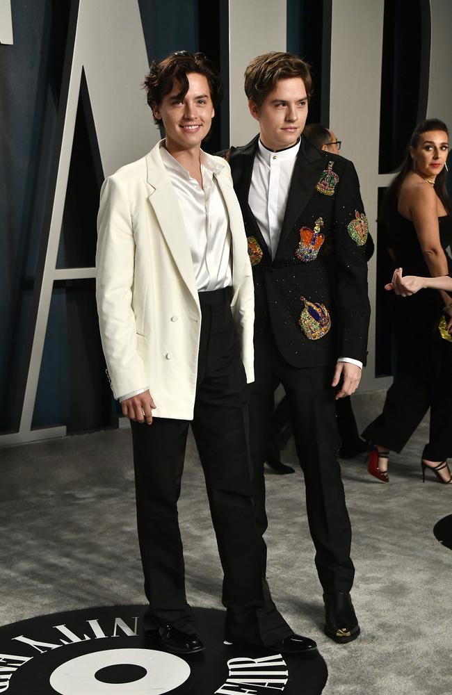 Cole Sprouse and Dylan Sprouse attend the 2020 Vanity Fair Oscar Party hosted by Radhika Jones at Wallis Annenberg Center for the Performing Arts on February 09, 2020 in Beverly Hills, California. (Photo by Frazer Harrison/Getty Images)