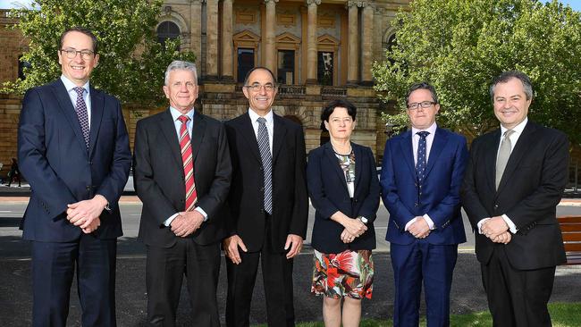 Supreme Court Chief Justice Chris Kourakis and Court of Appeal President Justice Trish Kelly, flanked by Court of Appeal Justices Chris Bleby, David Lovell, Sam Doyle and Mark Livesey in front of the Supreme Court. Picture: Mark Brake