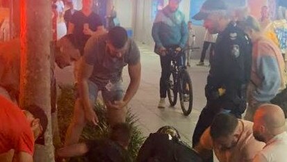 Two patrons involved in a fight with Cali Beach Club security outside the venue - in the aftermath one man was restrained by police and the other was knocked unconscious. It occurred on Surfers Paradise Boulevard just after 10.30pm