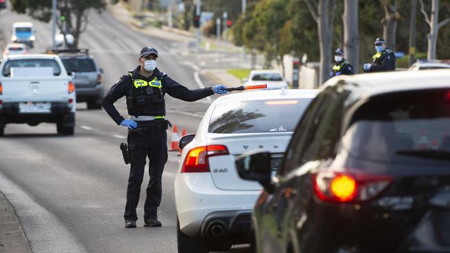 Residents in locked down suburbs will be stopped by police to ensure they have a valid reason for travelling in and out of the area. Picture: Rob Leeson.