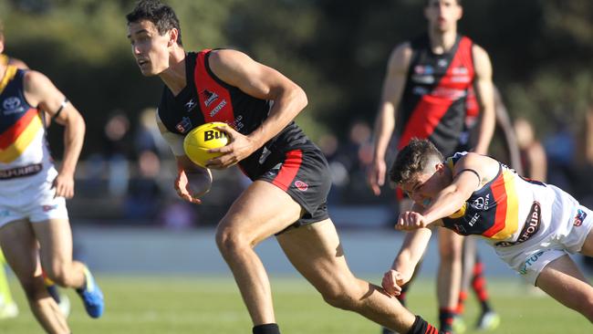 West's Tom Keough evades a tackle. Picture: AAP Image/Dean Martin