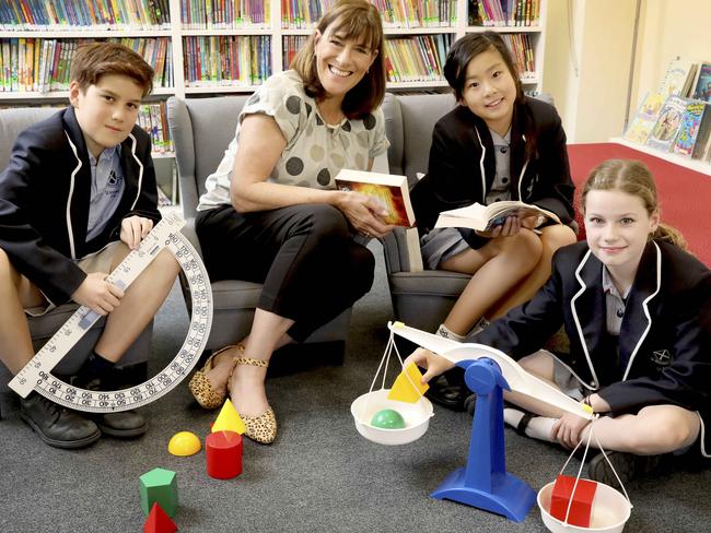 St Andrew's is best school in SA at NAPLAN at Year 5 level. Principal Deb Dalwood with year 5 students, Nazareth Bucki,11, Aurelia Cheng,10, and Nina Fox,11. 4 December 2019. Picture Dean Martin