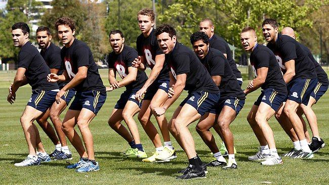 Steve Motlop, centre, leads the Indigenous All Stars in a war cry yesterday in Melbourne. Picture: Michael Klein.