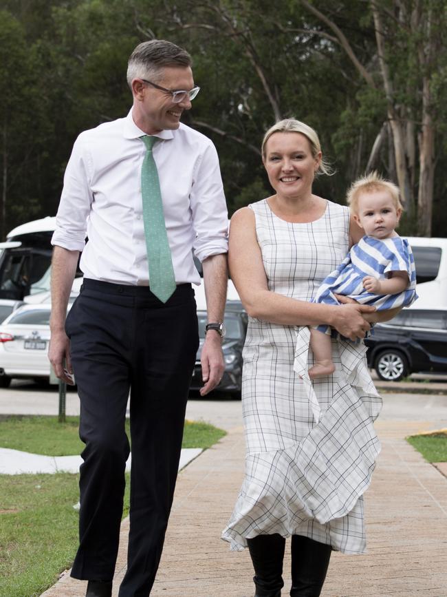 Dominic Perrottet campaigns with wife Helen and daughter Celeste, 1, in Penrith in Sydney’s west on Friday. Picture: NCA Newswire/ Monique Harmer