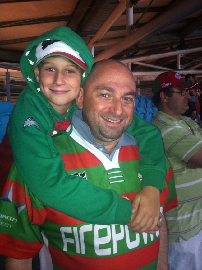 Niko and son Evan at the 2014 Grand Final. Pic Supplied