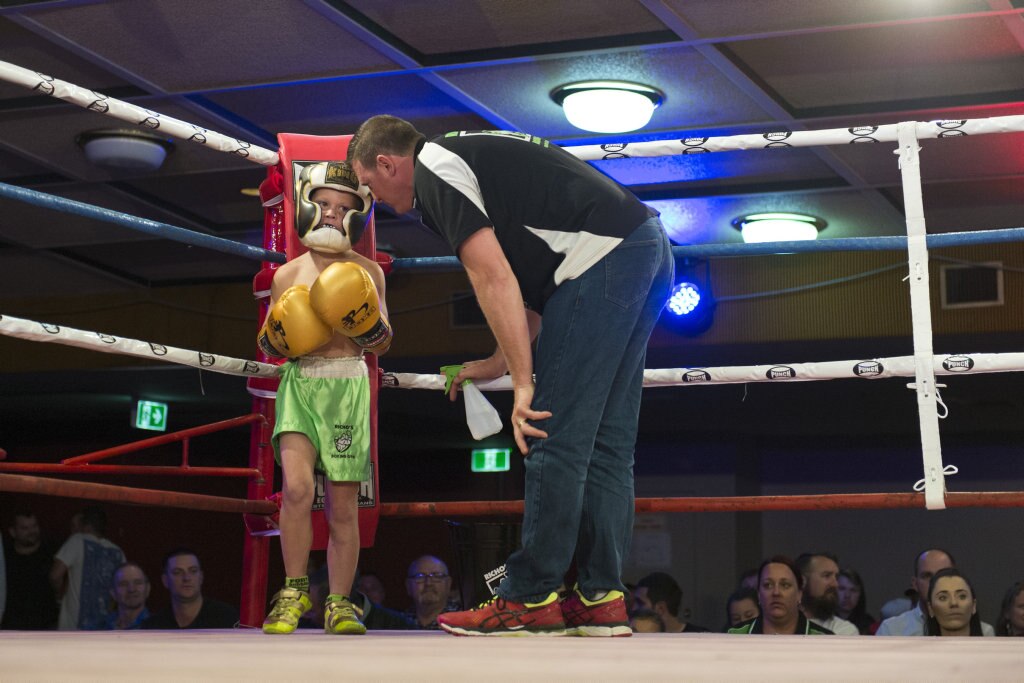 Junior Richards gets advice from dad Brett Richards of Richo's Boxing Gym before a fundraising bout against Adrian Young at Smithy and TGW Bring The Big Fights 14 at Rumours International, Saturday, October 22, 2016. Picture: Kevin Farmer
