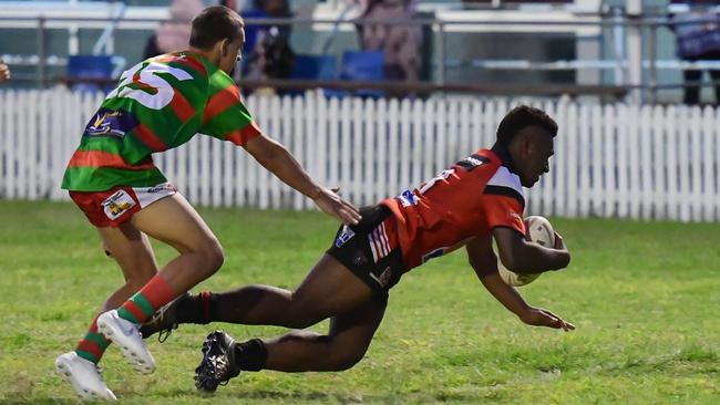 Livingston Lingawa goes over the line for the Panthers.