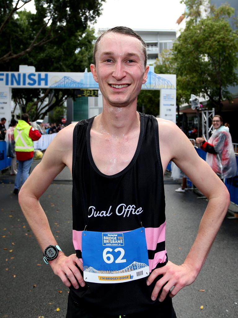 <p>Rory Hunter, winner of the Bridge to Brisbane 10 klm race. Sunday, August 26, 2018 (AAP Image/Richard Waugh)</p>