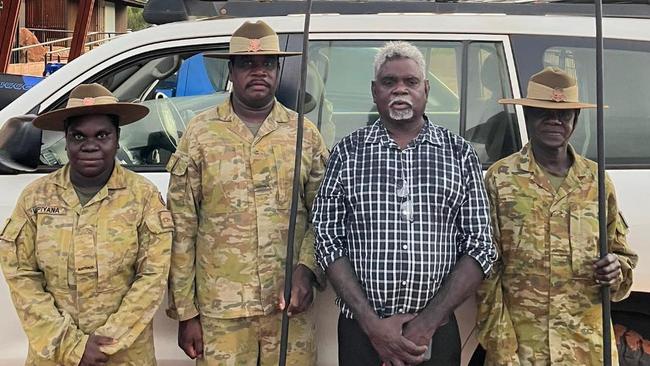 Mulka MLA Yingiya Guyula with NORFORCE members at the Gove Boat Club following the ANZAC Day dawn service on April 25, 2024.