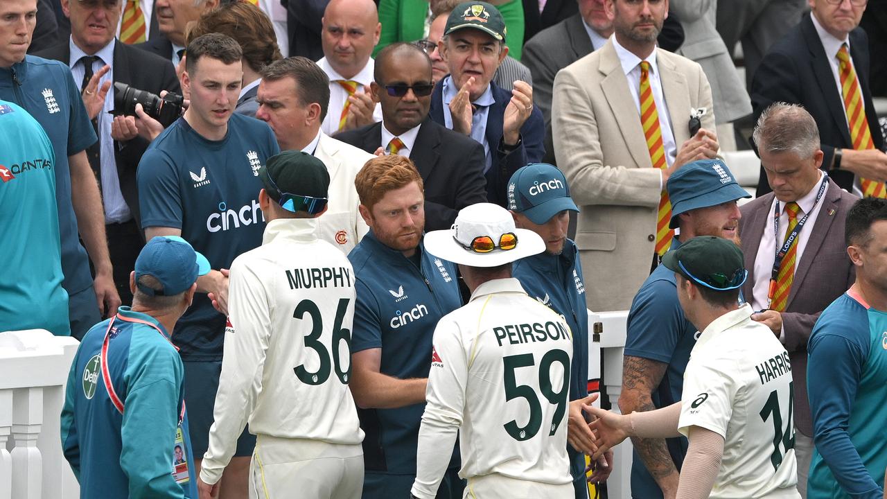 England player Jonny Bairstow shakes hands with the Australian players. Photo by Stu Forster/Getty Images
