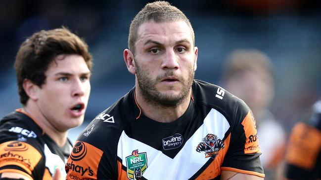 Tigers Robbie Farah passes during the NRL game between the Wests Tigers and the New Zealand Warriors at Campbelltown Stadium , Campbelltown.Picture Gregg Porteous