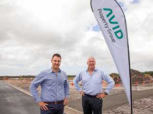 AVID Property Group's Harmony development manager Anthony Demiris and general manager Qld Bruce Harper on site at Palmview earlier this year. Mr Harper has vowed the opening stage will be complete by month's end. Picture: Gary Mills