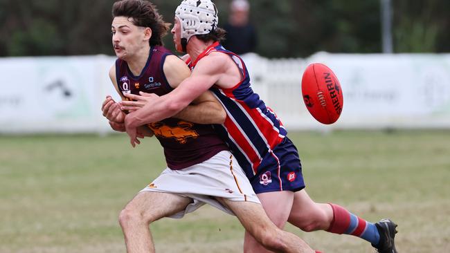 Action from the Colts game between Wilston Grange and Palm Beach Currumbin. Pictured is Currumbin’s Jack Foggo, left. Picture: Tertius Pickard