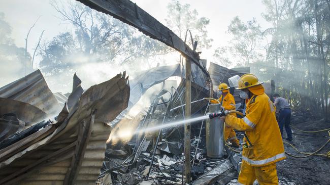 Three homes were destroyed by fire at Noosa North Shore on Saturday, although that was not a bushfire. Picture: Lachie Millard