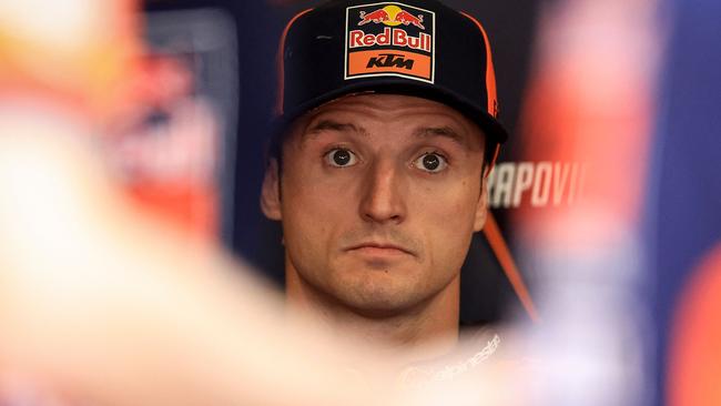 KTM Australian rider Jack Miller looks on in the box ahead of the MotoGP qualifying session of the Portuguese Grand Prix at the Algarve International Circuit in Portimao on March 23, 2024. (Photo by PATRICIA DE MELO MOREIRA / AFP)