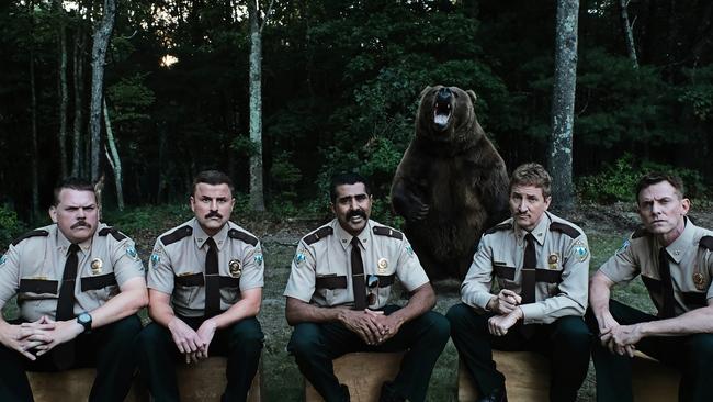 Stars of film Super Troopers 2 with a grizzly bear named Whopper L-R: Kevin Heffernan, Steve Lemme, Jay Chandrasekhar, Paul Soter and Erik Stolhanske