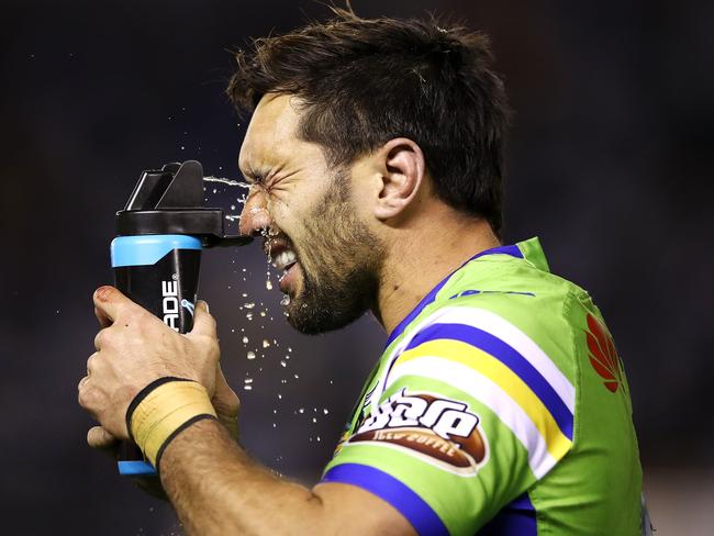 Jordan Rapana sprays water on his eye during the round 19 NRL match between the Cronulla Sharks and the Canberra Raiders at Southern Cross Group Stadium. Picture: Getty Images