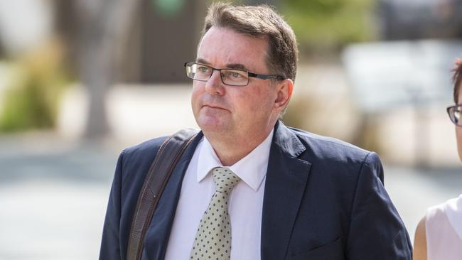 Ex-Logan mayor Luke Smith (centre) arrives at Beenleigh Magistrates Court on Friday, January 24, 2020. A former Queensland mayor accused of perjury and official corruption will face a second day of his committal hearing. (AAP Image/Glenn Hunt)