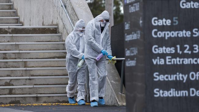 Cleaners at AAMI Park last week after a positive case attended the rugby. Picture: NCA NewsWire/Paul Jeffers