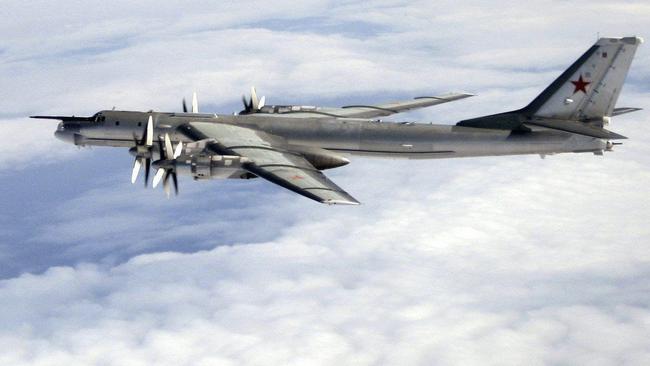 British RAF Typhoon jet aircraft (bottom) intercepting a Russian Bear- H plane as it approaches British air space in the North Atlantic Ocean 17 Aug 2007. aeroplane