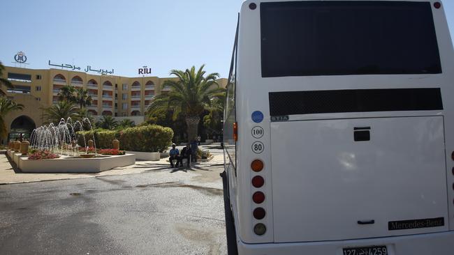 A coach transporting tourists leaves the Imperial Marhaba hotel, the scene of the Tunisia attack.