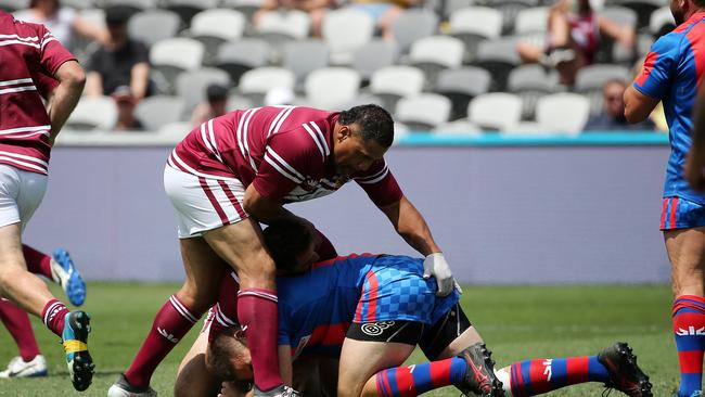 John Hopoate pretending to re-enact his infamous 2001 finger poking incident during a Legends of League charity game last month. Picture: Tim Hunter.