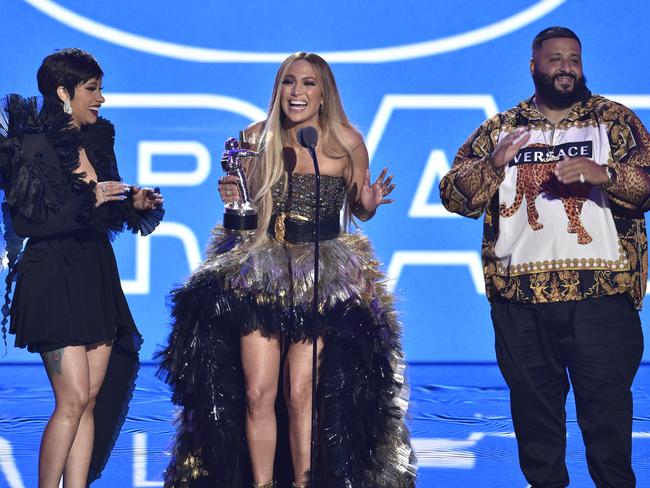 Cardi B, from left, Jennifer Lopez and DJ Khaled accept the award for best collaboration. Picture: AP