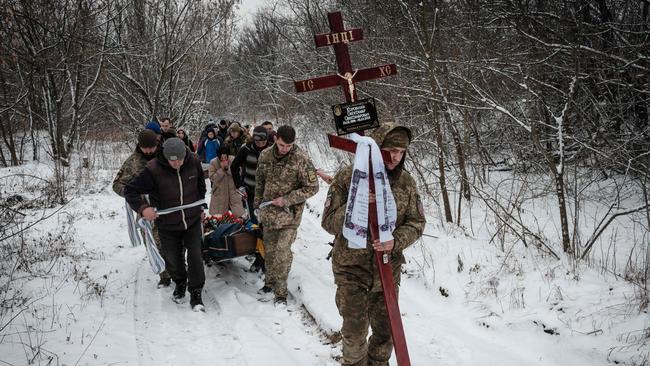 A funeral procession for Ukrainian Oleksandr Korovniy, killed in action at Bakhmut in January last year. Picture: AFP