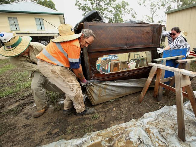 Queensland floods: ‘Mud army’ shines on active duty | The Courier Mail