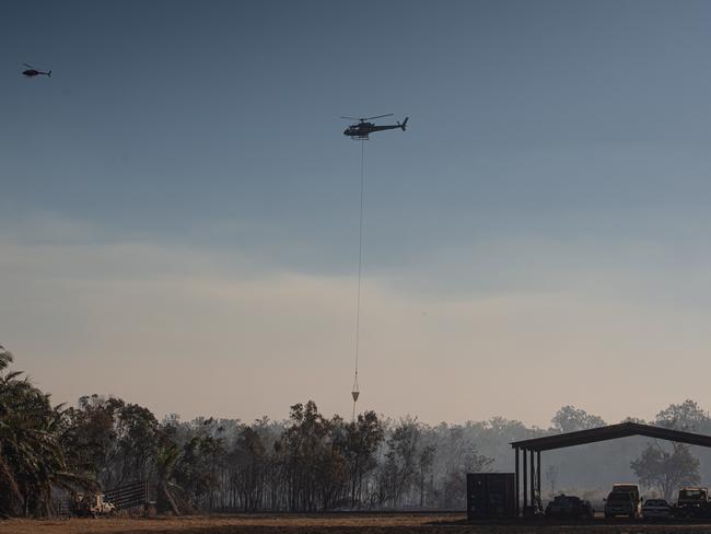 A bushfire ripped through the Livingstone area this afternoon, threatening local properties. Picture: Che Chorley