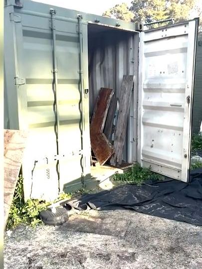 Incredible vision has revealed the moment police allegedly uncovered a sophisticated drug setup hidden under a trapdoor on the floor of a shipping container shed. Picture: WA Police