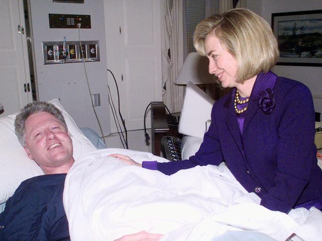 Hillary Clinton visiting former President Bill Clinton in hospital after he underwent surgery after tearing tendon in knee after slipping on stairs at Greg Norman’s home.