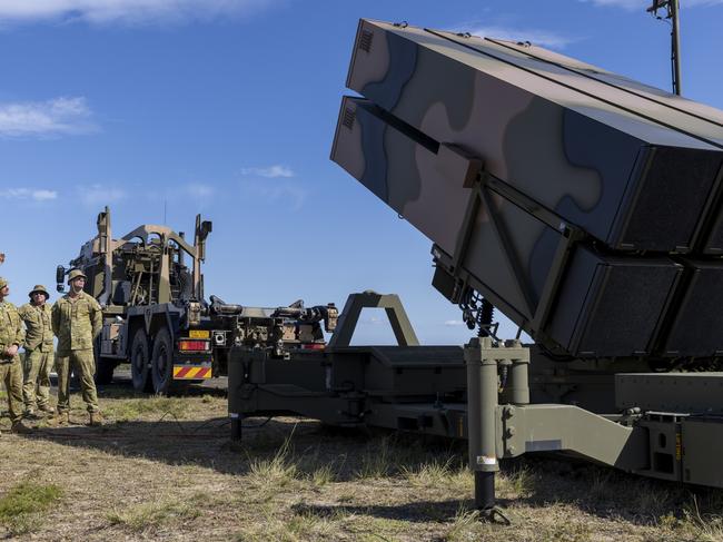 Australian Army soldiers from 16th Regiment, Royal Australian Artillery, National Advanced Surface-to-Air Missile System (NASAMS) training team, demonstrate the operation of the NASAMS Mk II Canister Launcher during a trial and certification activity at the Beecroft Weapons Range, NSW. *** Local Caption *** The Australian Army National Advanced Surface to Air Missile System (NASAMS) will provide a Beyond Visual Range (BVR) Ground Based Air Defence (GBAD) capability against airborne threats such as aircraft, unmanned aerial vehicles and cruise missiles through Project LAND 19 Phase 7B. Soldiers from 16th Regiment, Royal Australian Artillery, recently joined industry partners during a trail and certification activity at Beecroft Weapons Range in NSW.  The activity was a chance for soldiers to familiarise themselves with the new equipment and meet subject-matter experts from Raytheon and CEA Technologies prior to taking delivery of NASAMS.  Photo: Australian Department of Defence / Supplied