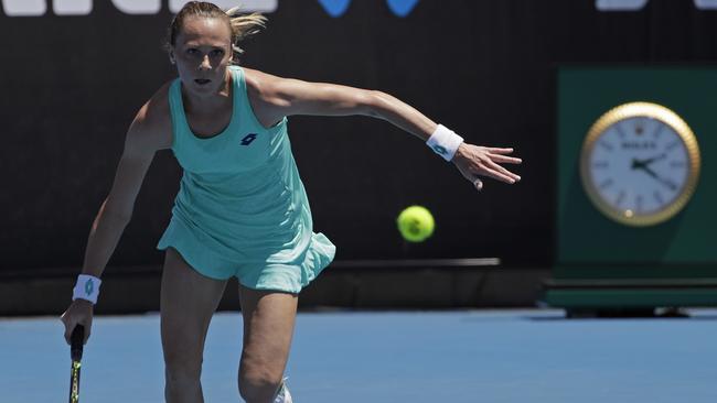 Slovakia's Magdalena Rybarikova chases down a shot from Kirsten Flipkens. Picture: AP