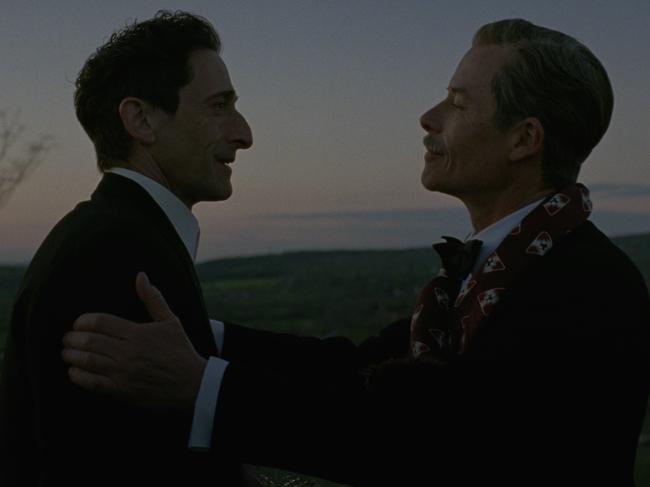 Adrien Brody and Guy Pearce in a scene from The Brutalist.